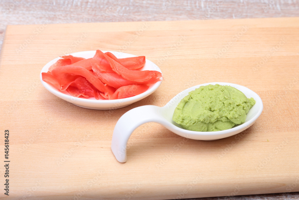 plate with Japanese wasabi sauce and pickled ginger. plate with Japanese wasabi sauce and pickled ginger.