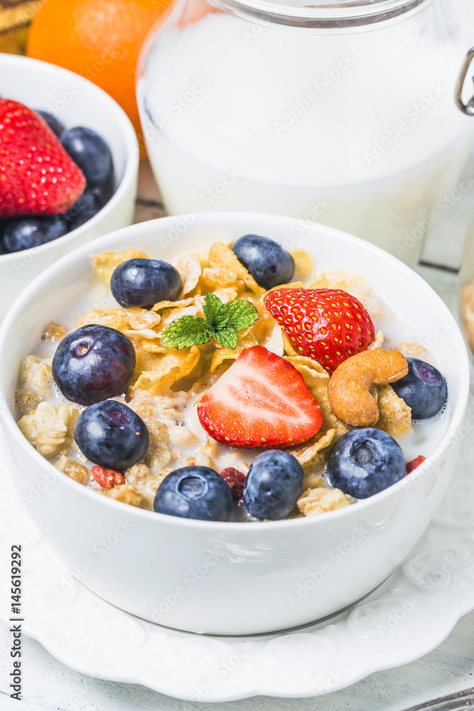 crunchy flakes with blueberries and various yogurts for healthy breakfast, close-up crunchy flakes with blueberries and various yogurts for healthy breakfast, close-up