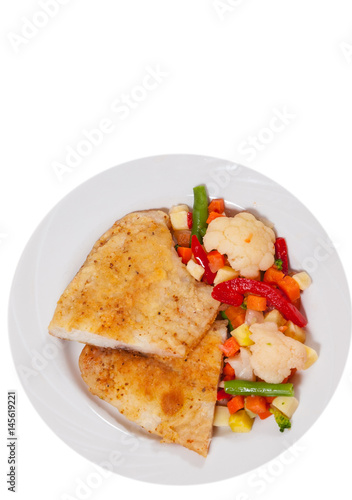 Fried fish fillet and Mixed vegetables. top view. isolated on white