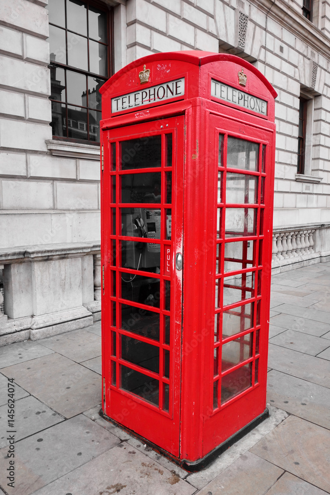 Street scene with a British phone box in London Street scene with a British phone box in London