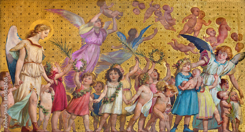 Valokuva TURIN, ITALY - MARCH 15, 2017: The symbolic fresco of holy innocents children with the angels in church Chiesa di San Dalmazzo by Enrico Reffo (1831-1917)
