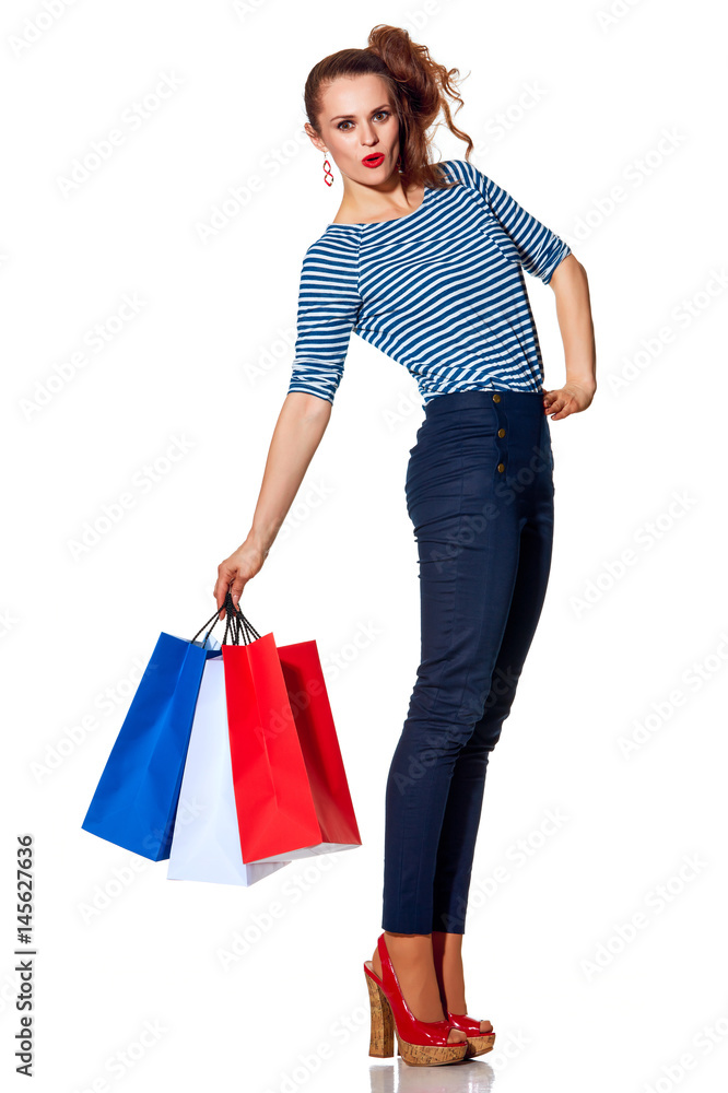 cheerful trendy woman with shopping bags on white background cheerful trendy woman with shopping bags on white background