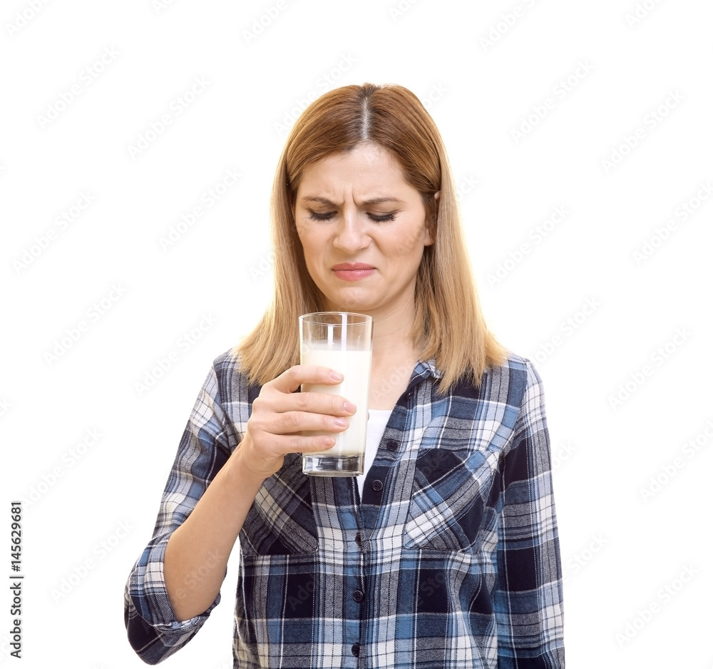 Woman with milk allergy on white background Woman with milk allergy on white background
