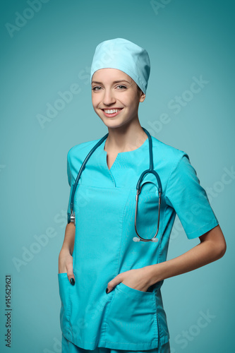 Beautiful young doctor with...