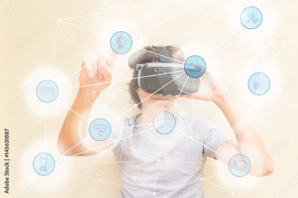 Teenager wearing and touching something in augmented reality wearing VR virtual realty glasses Teenager wearing and touching something in augmented reality wearing VR virtual realty glasses