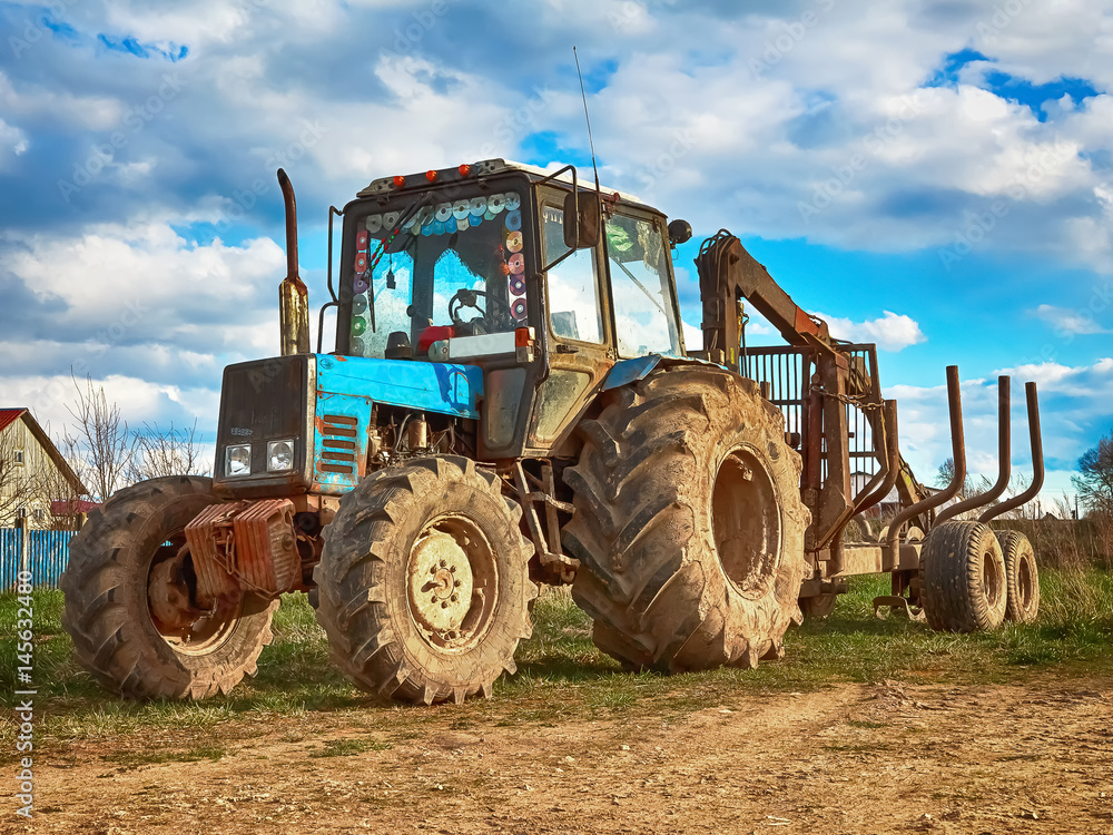 Tractor in the village against the sky Tractor in the village against the sky