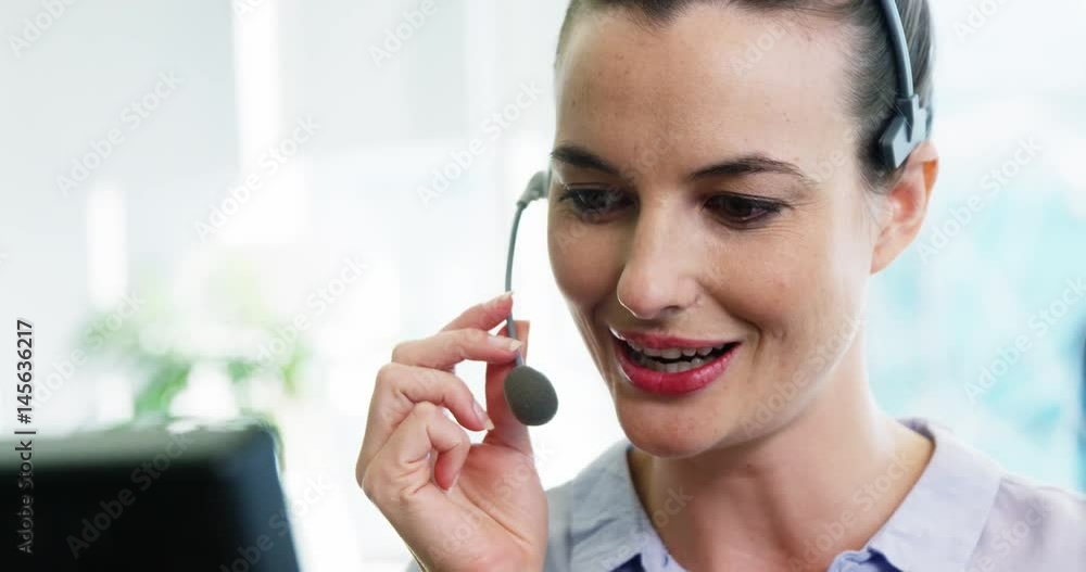 Female customer service executive working in call center Female customer service executive working in call center