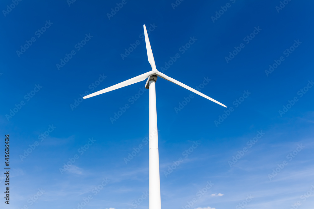 Wind turbine with blue sky - renewable energy Wind turbine with blue sky - renewable energy