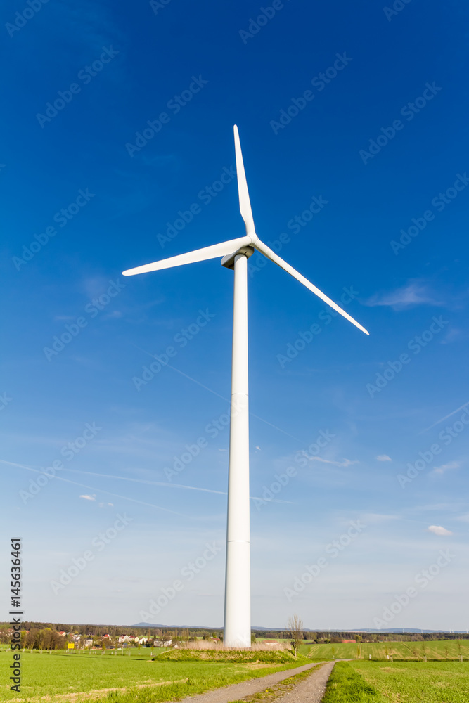 Wind turbine with blue sky - renewable energy Wind turbine with blue sky - renewable energy