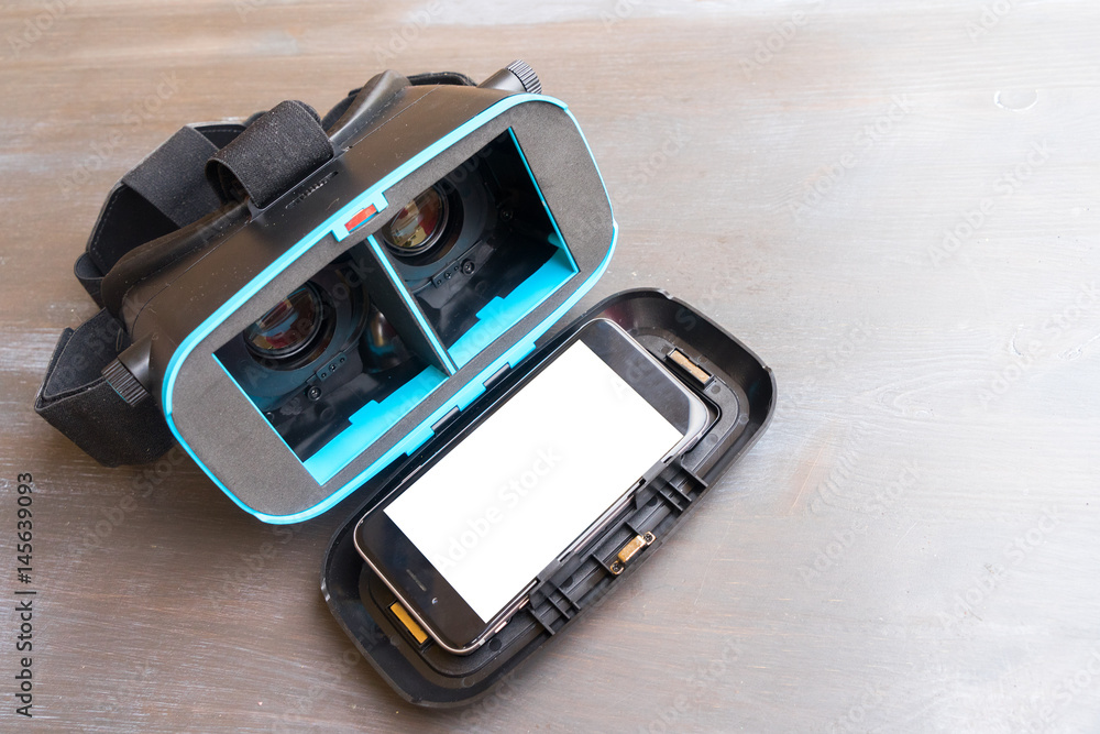 Virtual reality glasses - open one and phone with empty screen inside Virtual reality glasses - open one and phone with empty screen inside