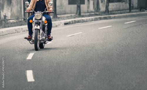Man riding motorcycle. 
