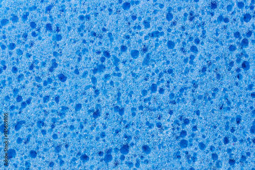 Blue sponge foam closeup texture.