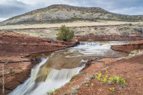 creek with waterfalls at Colorado foothills photo