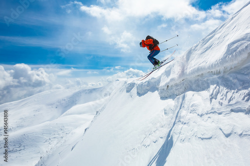 good skiing in the snowy mountains, Carpathians, Ukraine, good winter day, incredible ski jump, ski season