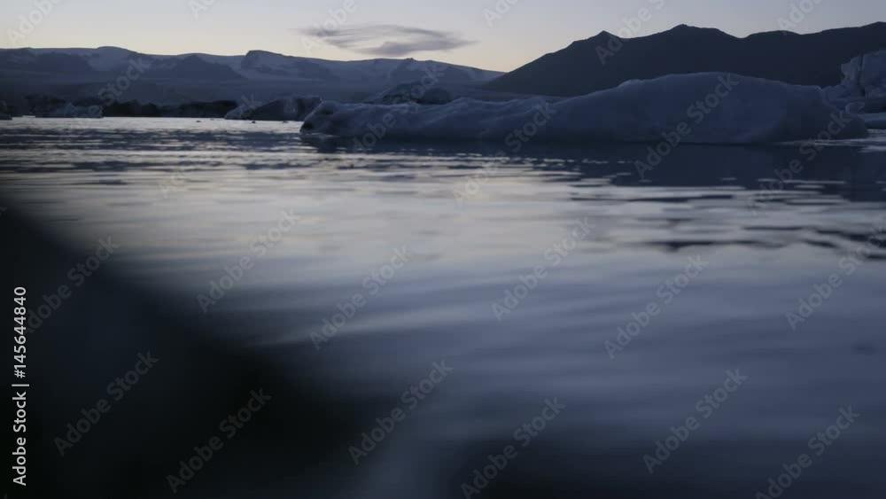 glaciers floating in water