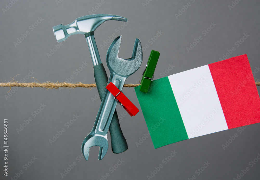 1 May Workers Day (labor day) text in italian. italy flag, Hammer and  wrench - grunge abstract image Stock Photo | Adobe Stock