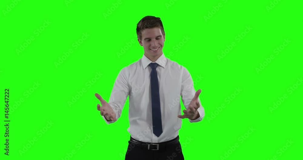 Businessman pretending to be hold invisible object Businessman pretending to be hold invisible object