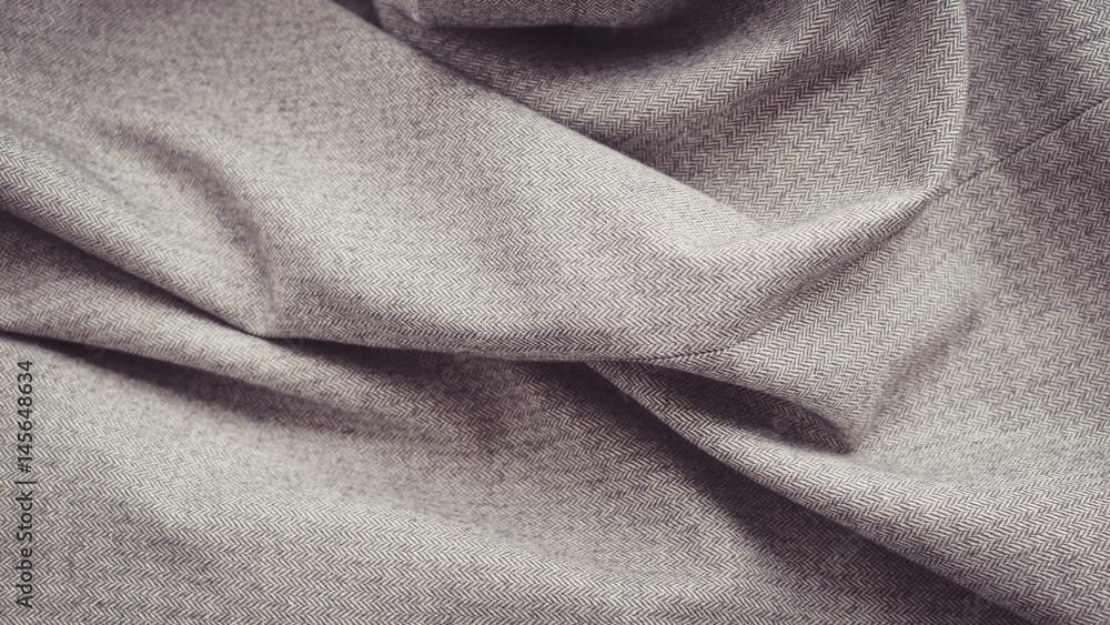 Crumpled white tweed fabric textile close up for grunge background. Crumpled white tweed fabric textile close up for grunge background.