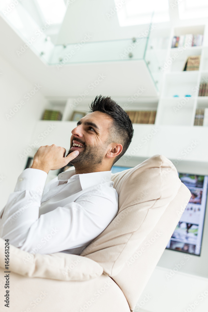 Fototapeta premium Young confident man at home