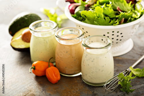Homemade ranch dressing variety in small jars photo