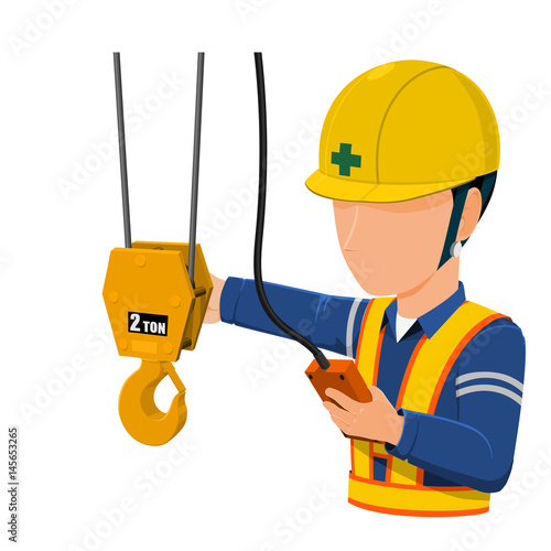 worker is using factory crane
