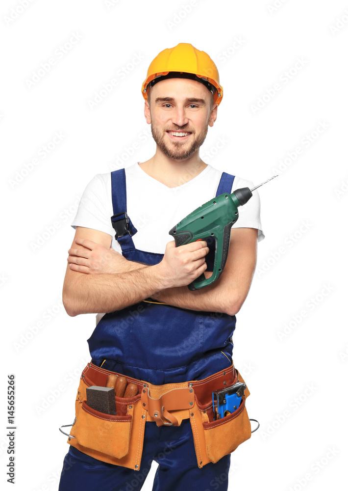 Handsome young carpenter on white background Handsome young carpenter on white background