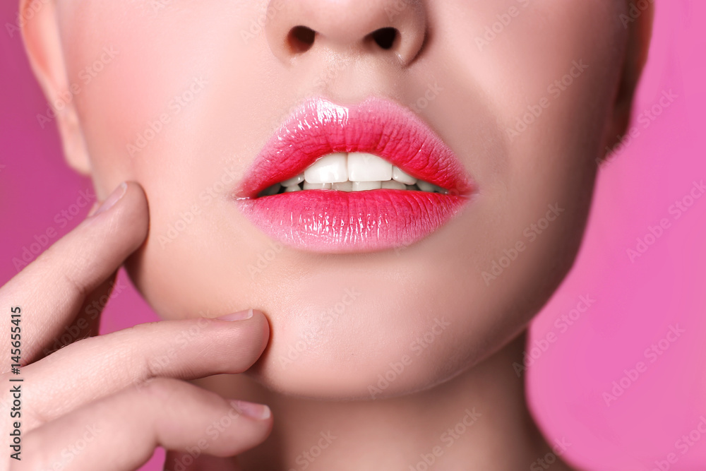 Face of beautiful young woman on color background, closeup Face of beautiful young woman on color background, closeup