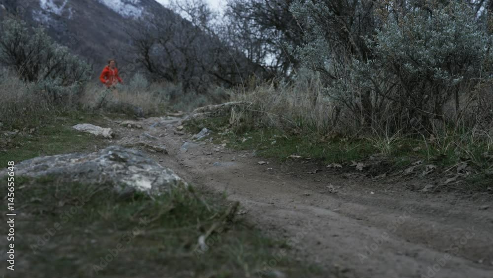 slow motion girl trail running in cool weather slow motion girl trail running in cool weather