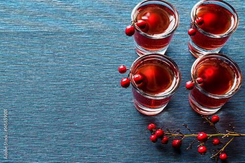 Cranberry cocktail shot with vodka