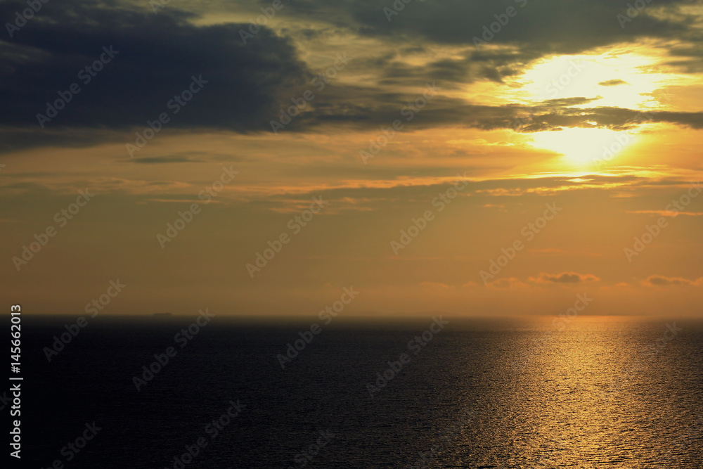 Golden water sea background on sunset over sea Golden water sea background on sunset over sea