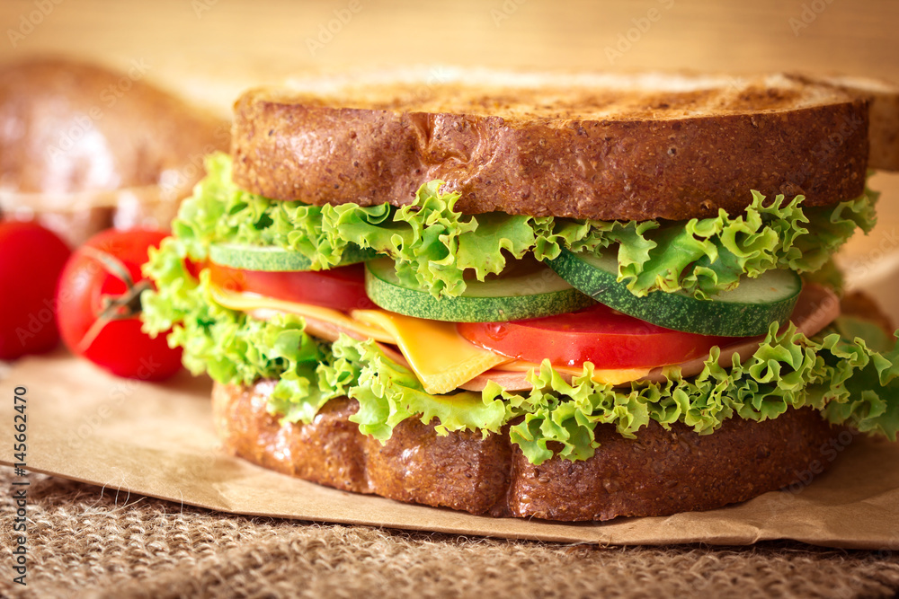 Grilled sandwiches bread with bacon , ham and cheese with vegetable , healthy breakfast Grilled sandwiches bread with bacon , ham and cheese with vegetable , healthy breakfast