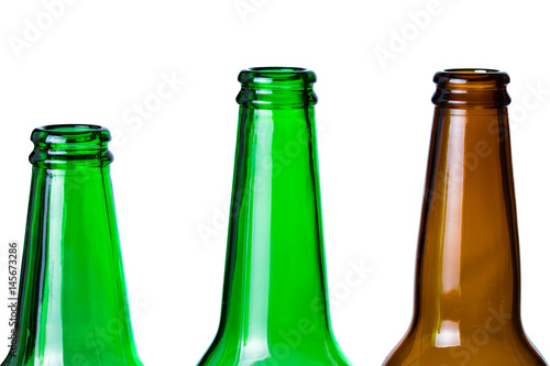 Obraz na płótnie Green and brown glass bottles necks isolated on white. w salonie
