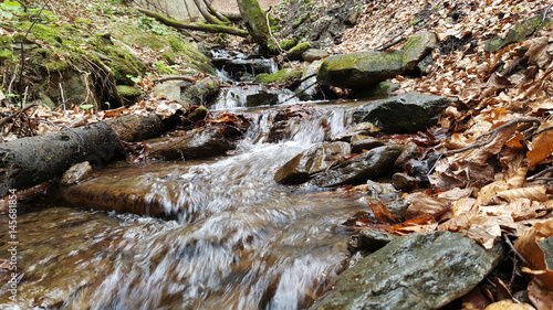 Fresh stream current between rocks