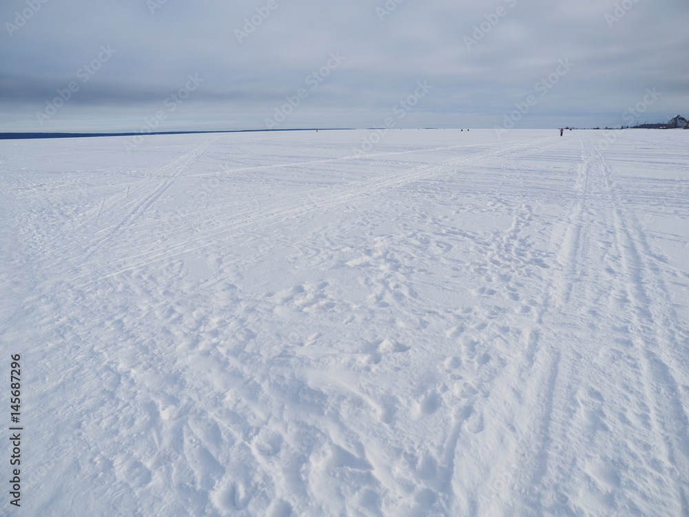 trails on the lake in winter