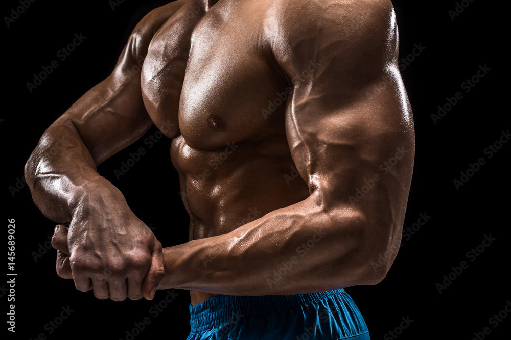 Part of a man's body on a dark background with copyspace Part of a man's body on a dark background with copyspace