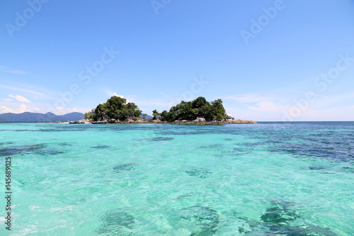 Tropical island country beautiful blue sea and clear blue sky,Image for summer fun party travel concept.