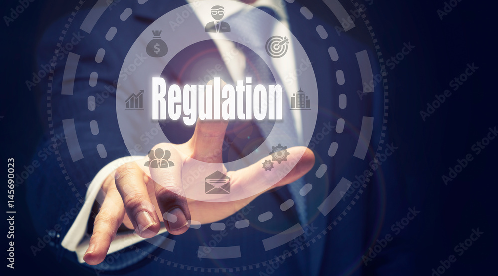 A finger pushing a Regulation Concept A finger pushing a Regulation Concept