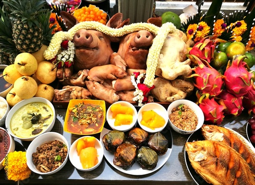  Pig's head and side dish  to worship God is to give Him our love in the Traditions Of Thailand photo