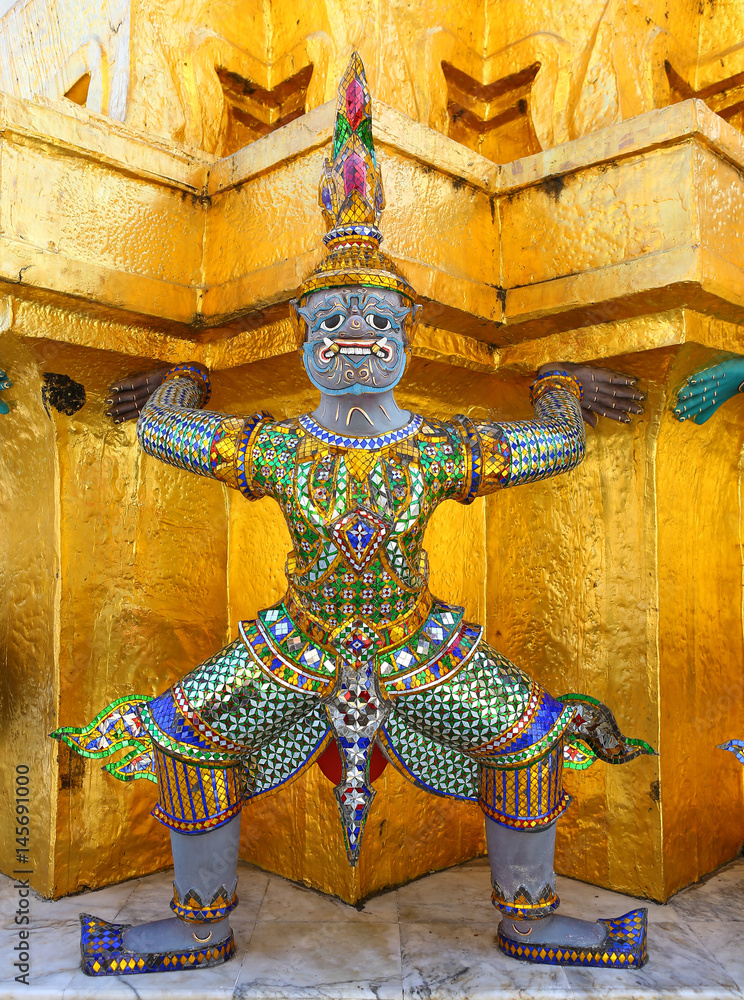 Giant statue is the guardian in wat phra kaew on display at wat phra kaew in Bangkok, Thailand.