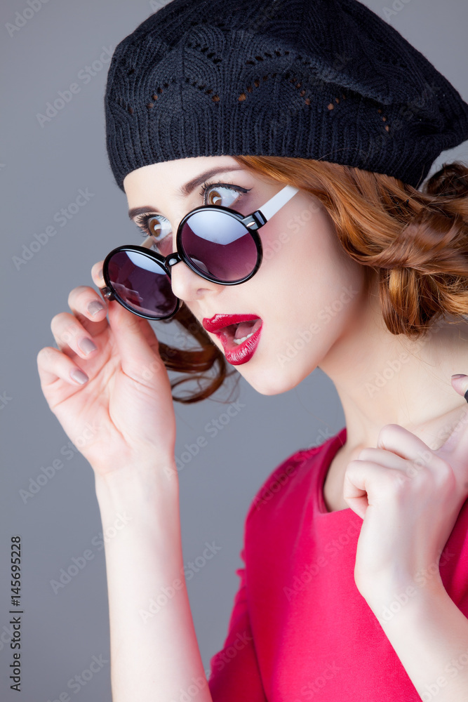 portrait of beautiful young woman holding jacket on the wonderful grey studio background portrait of beautiful young woman holding jacket on the wonderful grey studio background
