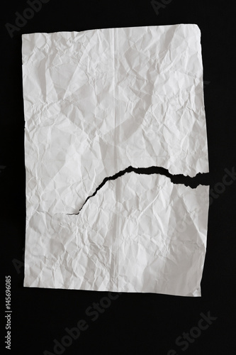 Crumpled torn white paper texture