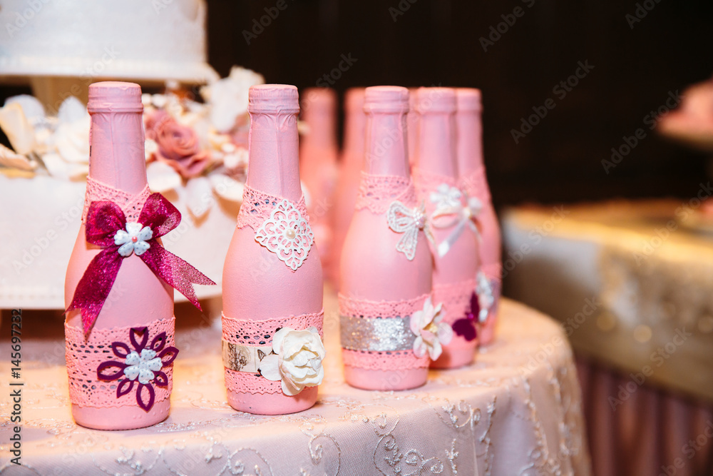 pink bottles of champagne at candy bar pink bottles of champagne at candy bar