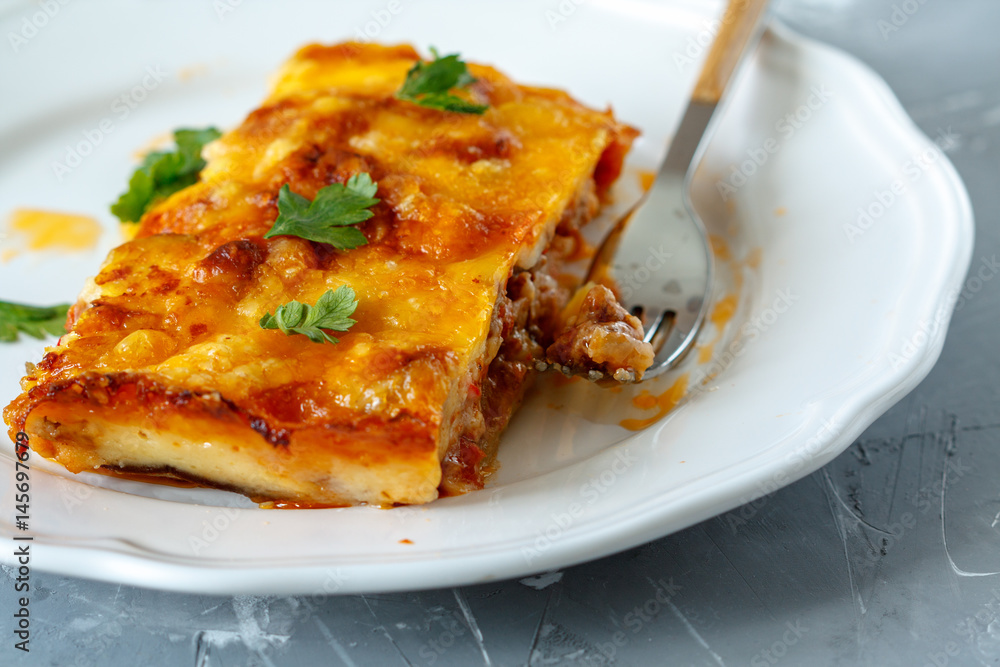 Greek style moussaka with eggplants, ground beef and potatoes. Greek style moussaka with eggplants, ground beef and potatoes.