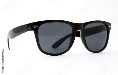 Cool sunglasses with black plastic frame isolated on white background