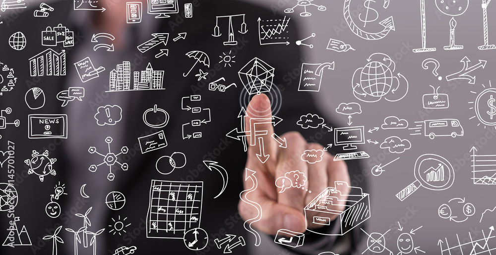 Man touching business doddles on a touch screen Man touching business doddles on a touch screen