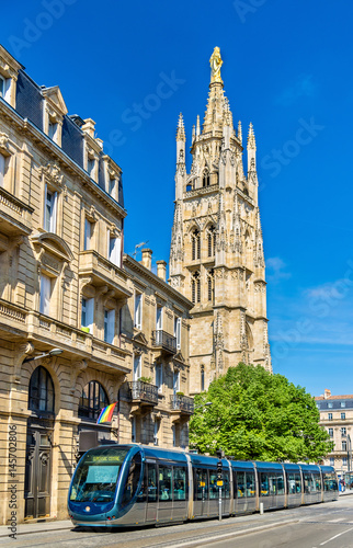 City tram at the Cathedral of Bordeaux, France