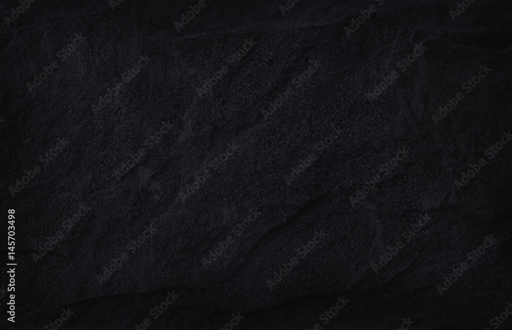 Fototapeta premium Dark gray black slate natural pattern for background and design.