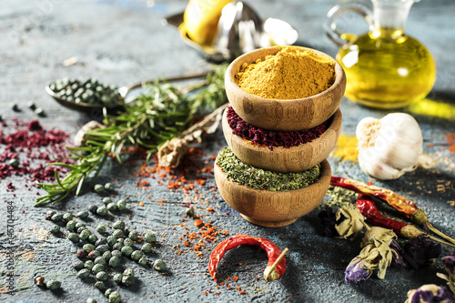 Fototapeta Naklejka Na Ścianę i Meble -  Spices and herbs on wooden background