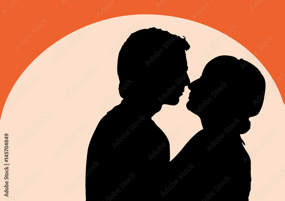 Silhouettes of young men and women on sunset background