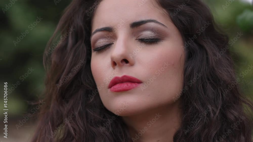 Close up on alone and sad beautiful brunette .depressed woman portrait,outdoor Close up on alone and sad beautiful brunette .depressed woman portrait,outdoor